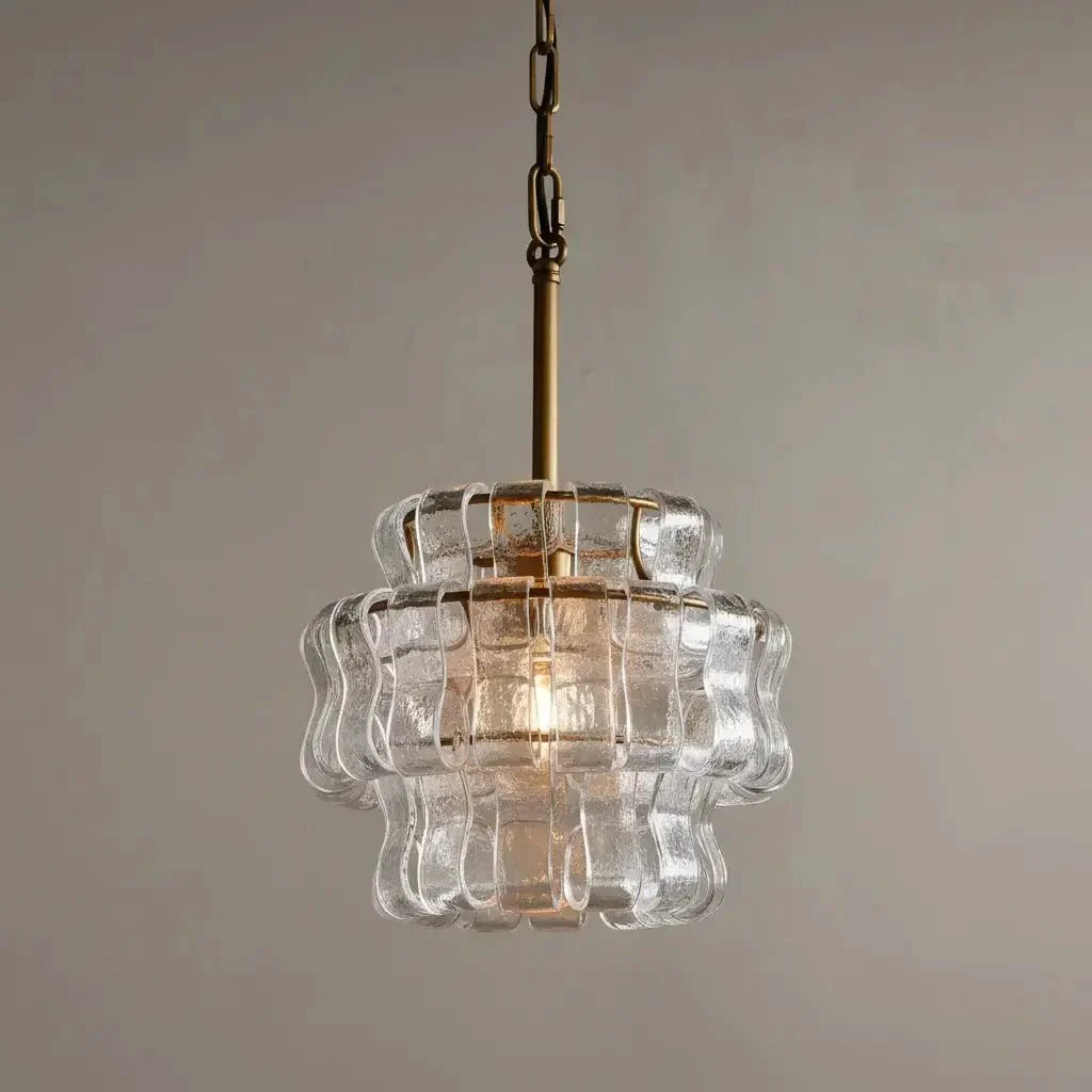 Riviera glass pendant illuminated over a kitchen island