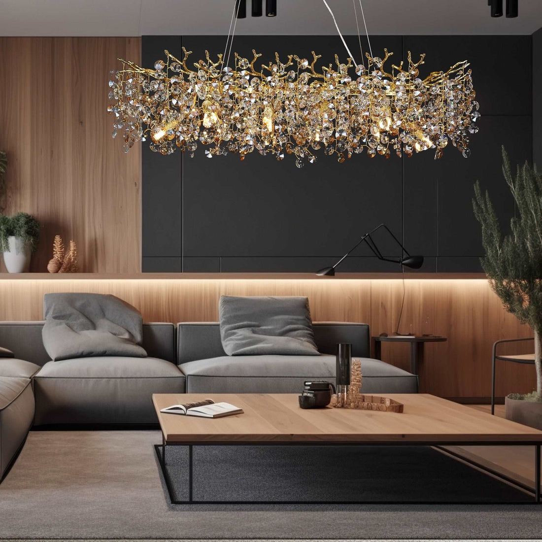 Albero crystal dining chandelier on a gold frame over a table
