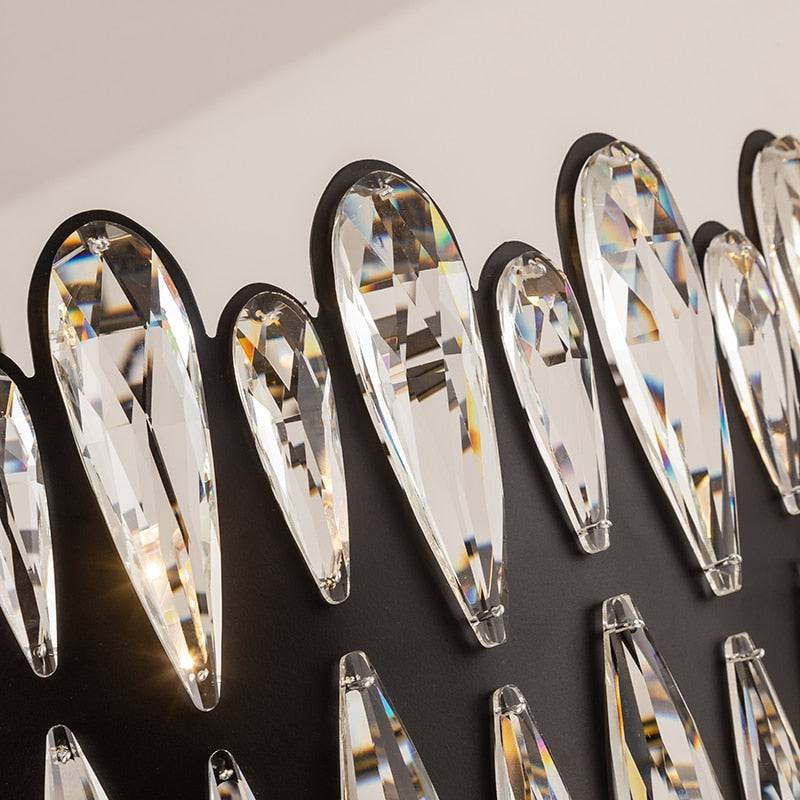 Napoli crystal modern chandelier by Morsale.com, a sculptural round fixture of genuine K9 crystal on sweeping stainless steel arms.