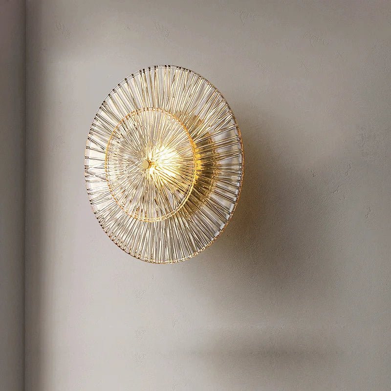 Clara wall sconce in solid brass and faceted glass