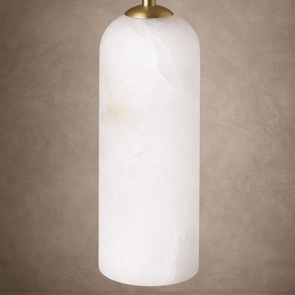 Mirasol marble and brass wall sconce in a hallway setting
