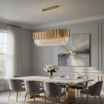 Gio gold crystal dining chandelier over a dining table