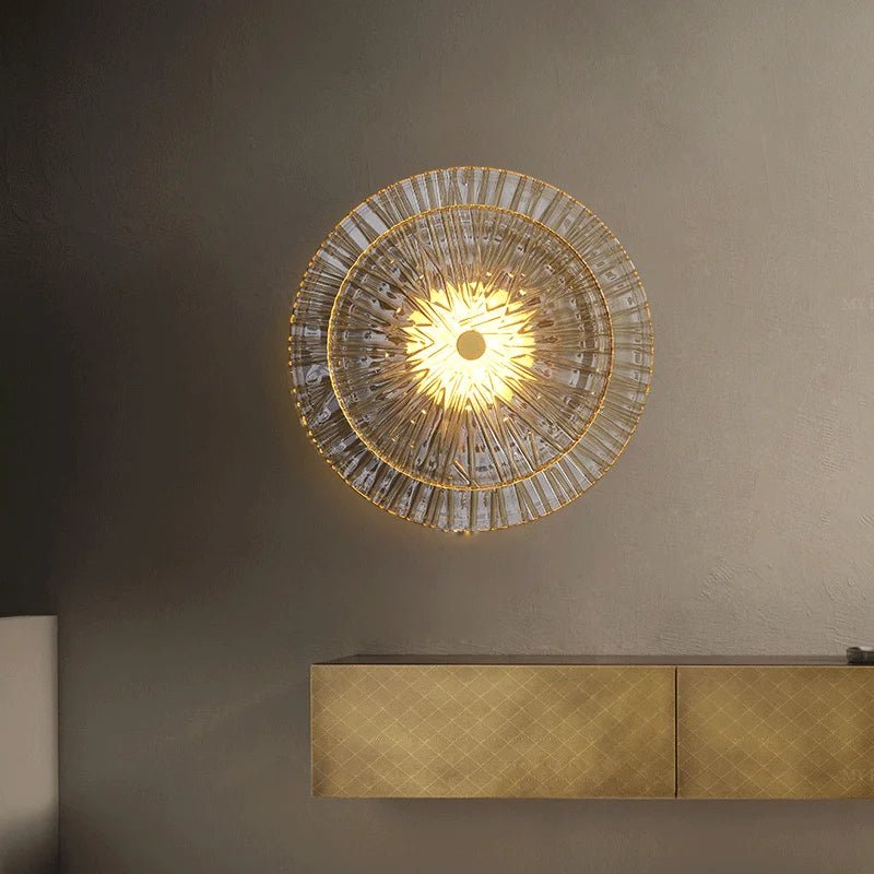 Clara wall sconce in solid brass and faceted glass