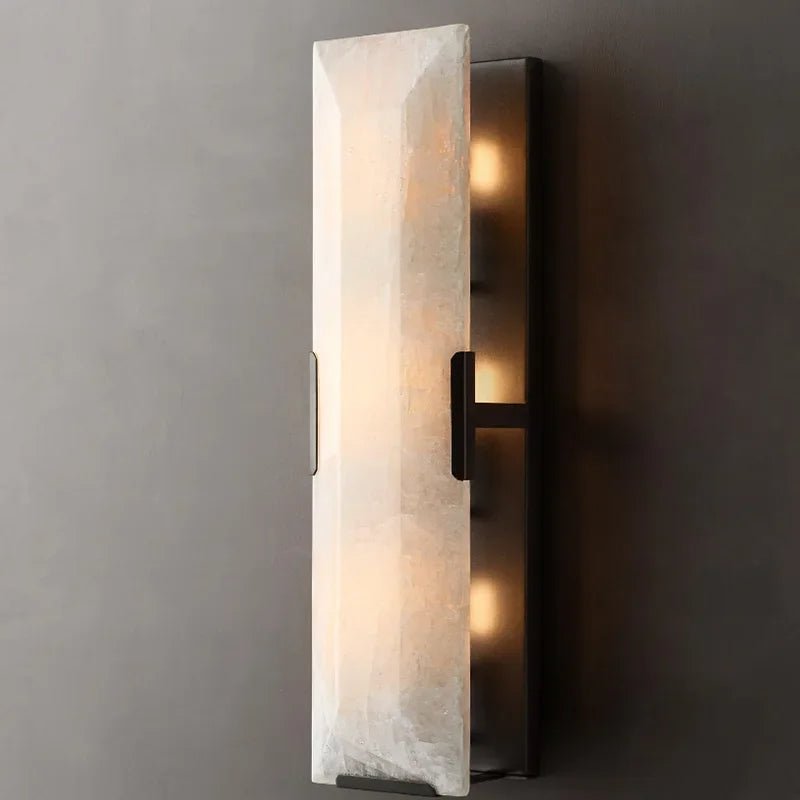Brookhill calcite wall sconce mounted on a wall