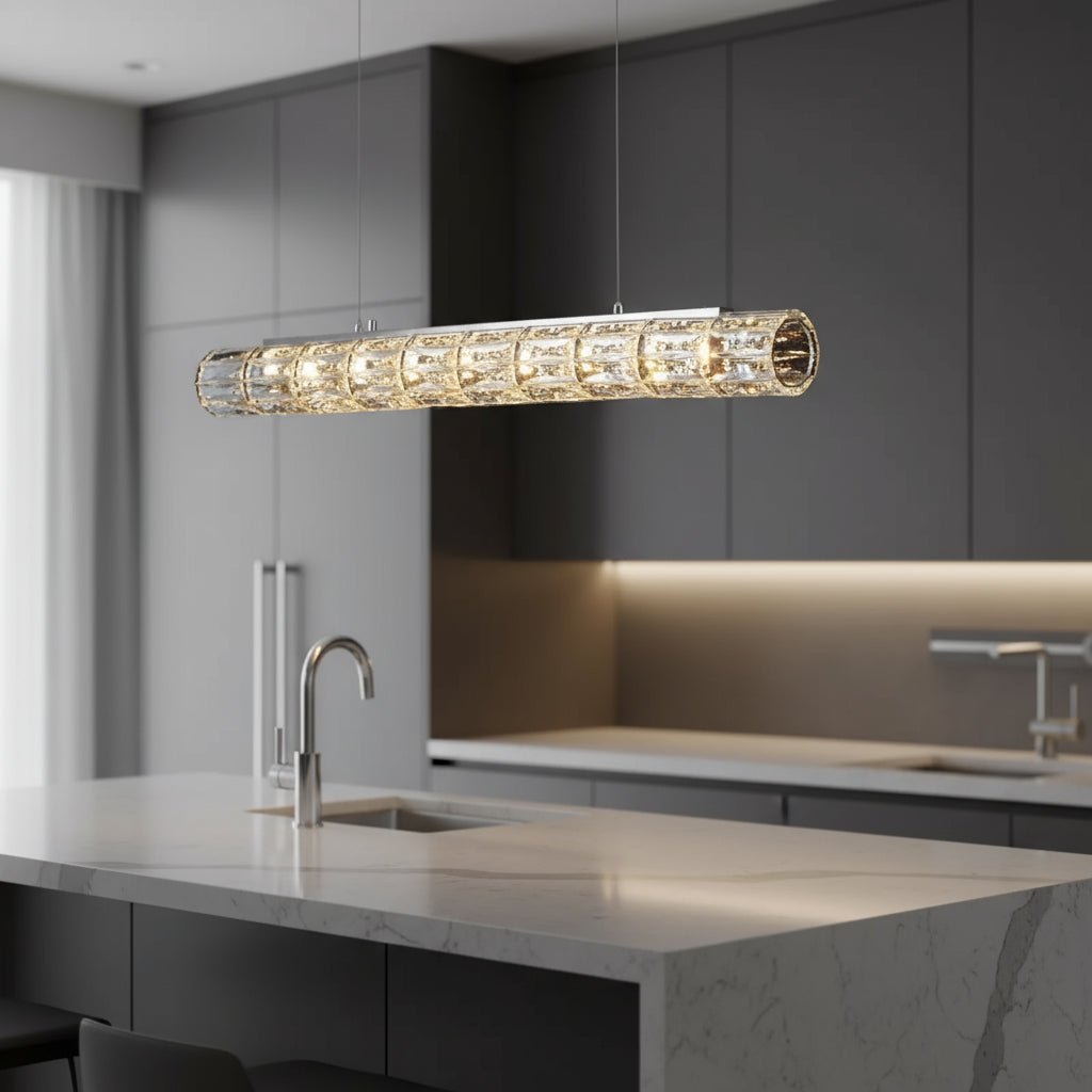 Bacci linear crystal suspension light over a dining table
