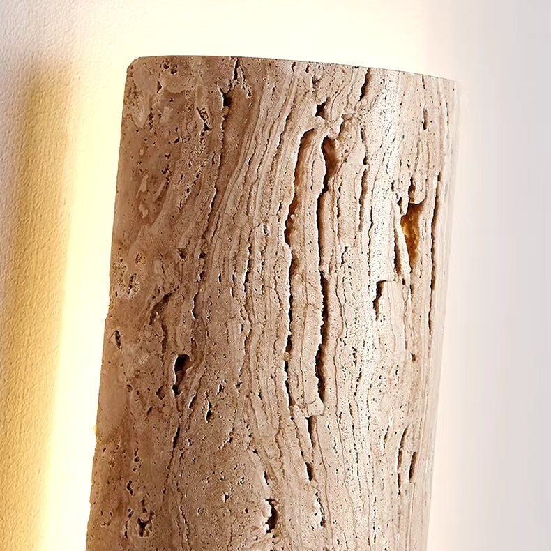 Solterra travertine sconce in a bathroom setting