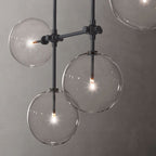 Lucelle Glass Globe Linear Chandelier 60"