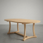 Wooden dining table on a gray floor with a neutral background