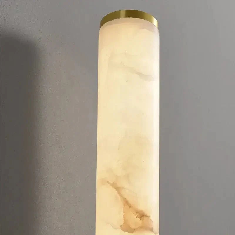 Altura 27-inch marble wall sconce in a hallway setting