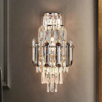 Lazzo smoke and clear crystal wall sconce in a hallway