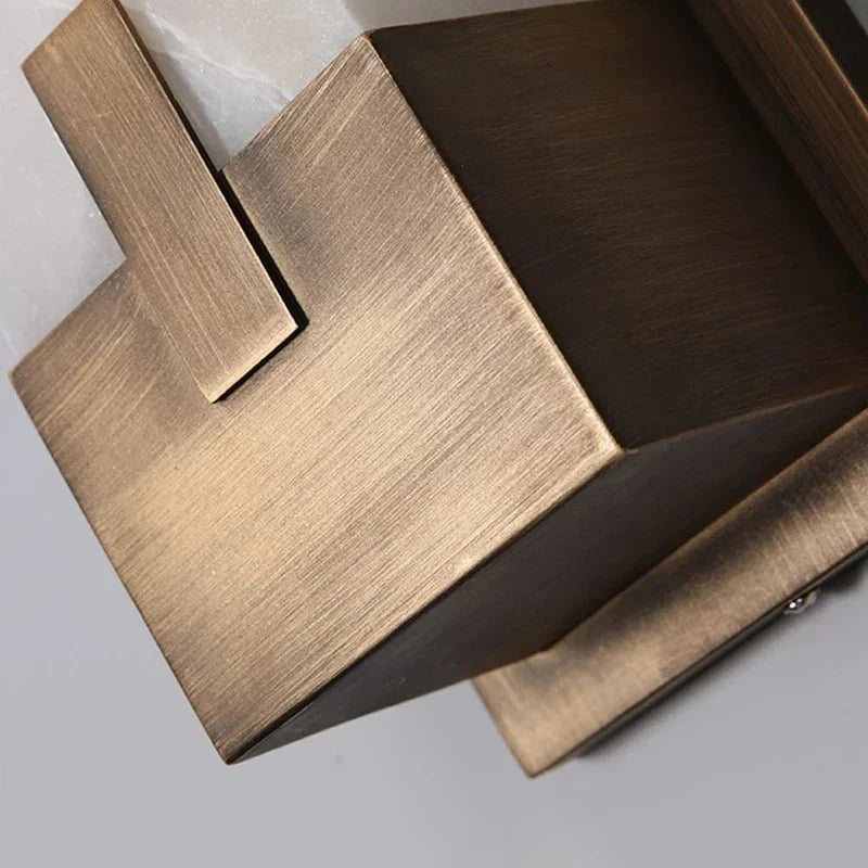 Altara marble sconce warm glow detail