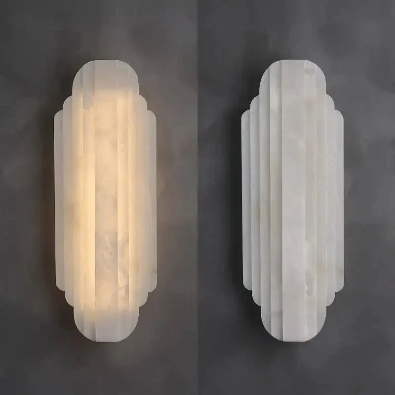Arina marble wall sconce mounted in a hallway