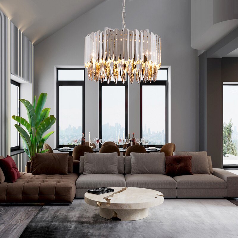 The Legance smokey crystal chandelier by Morsale.com at an event, glittering tables and walls.