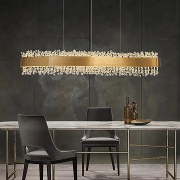 Capri linear crystal chandelier over a dining table
