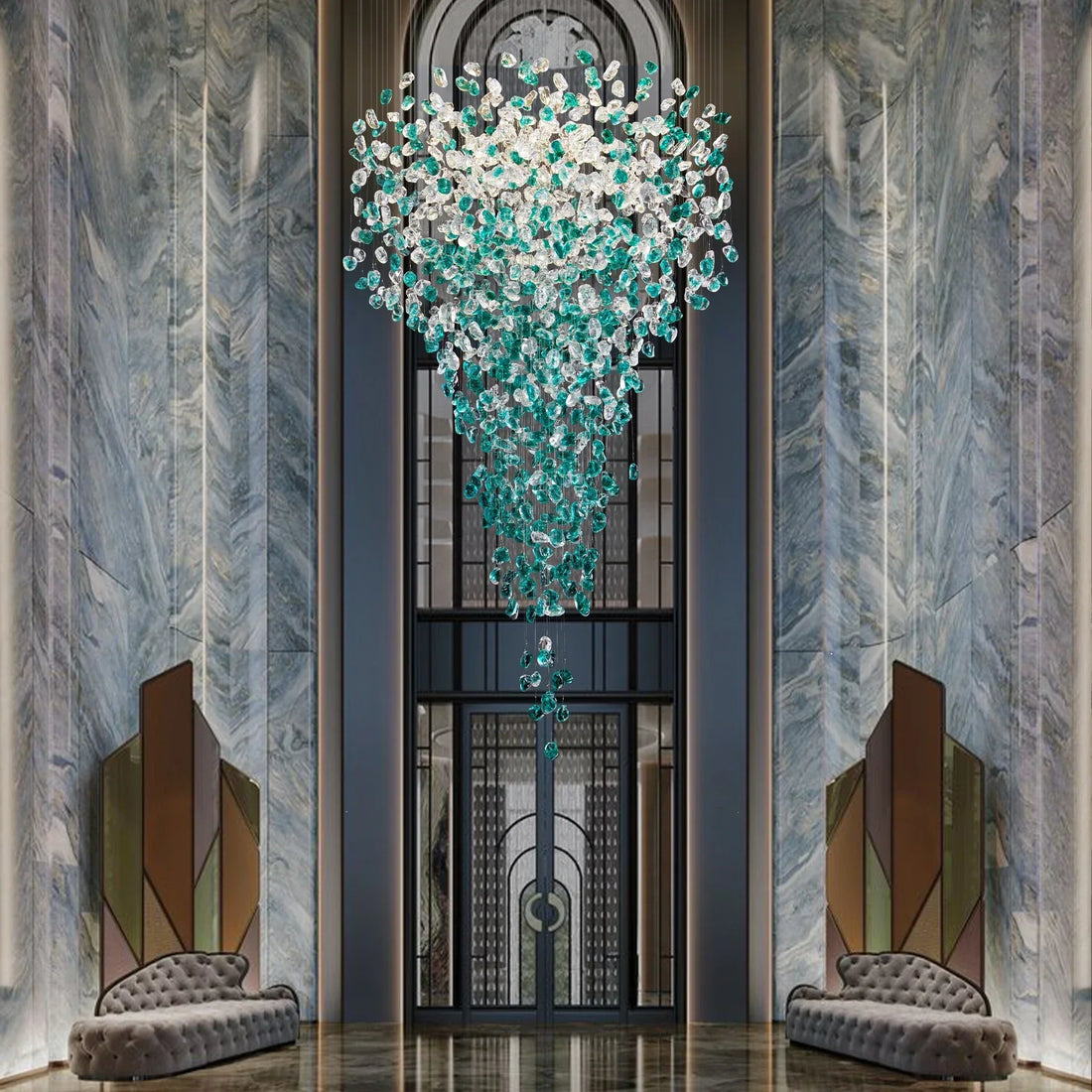 Verde crystal foyer chandelier in a grand entryway