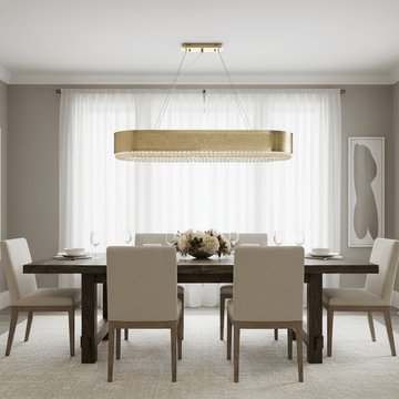 Giovanni gold crystal dining chandelier over a dining table