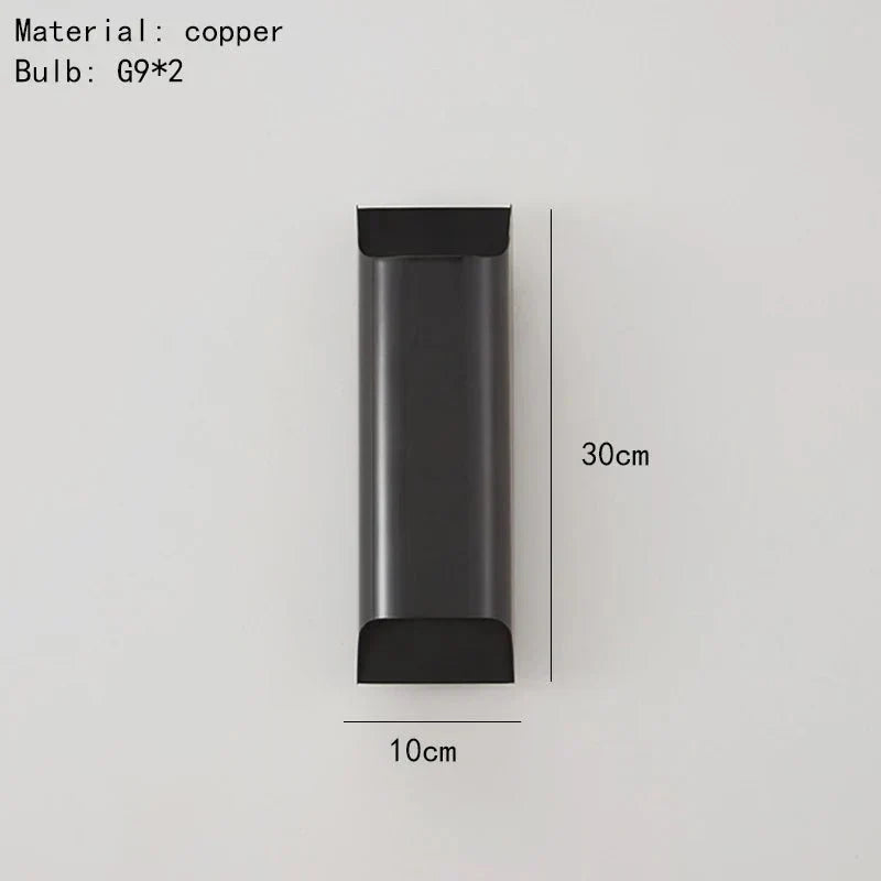 Rame copper wall sconce casting light up and down a wall
