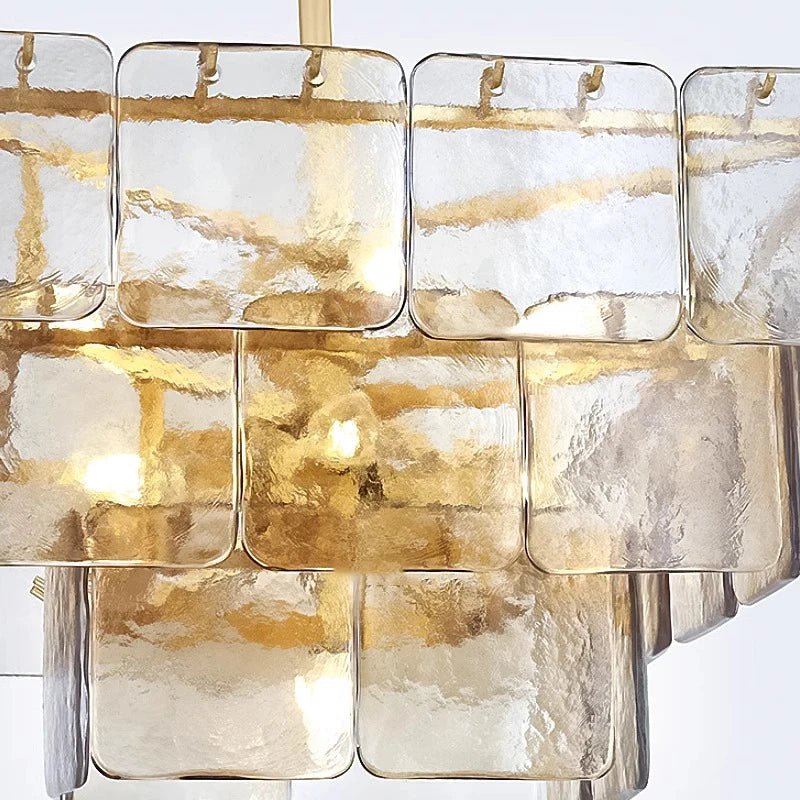 Detail of the clear glass shade on the Welle chandelier