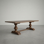Wooden table with decorative legs on a plain background