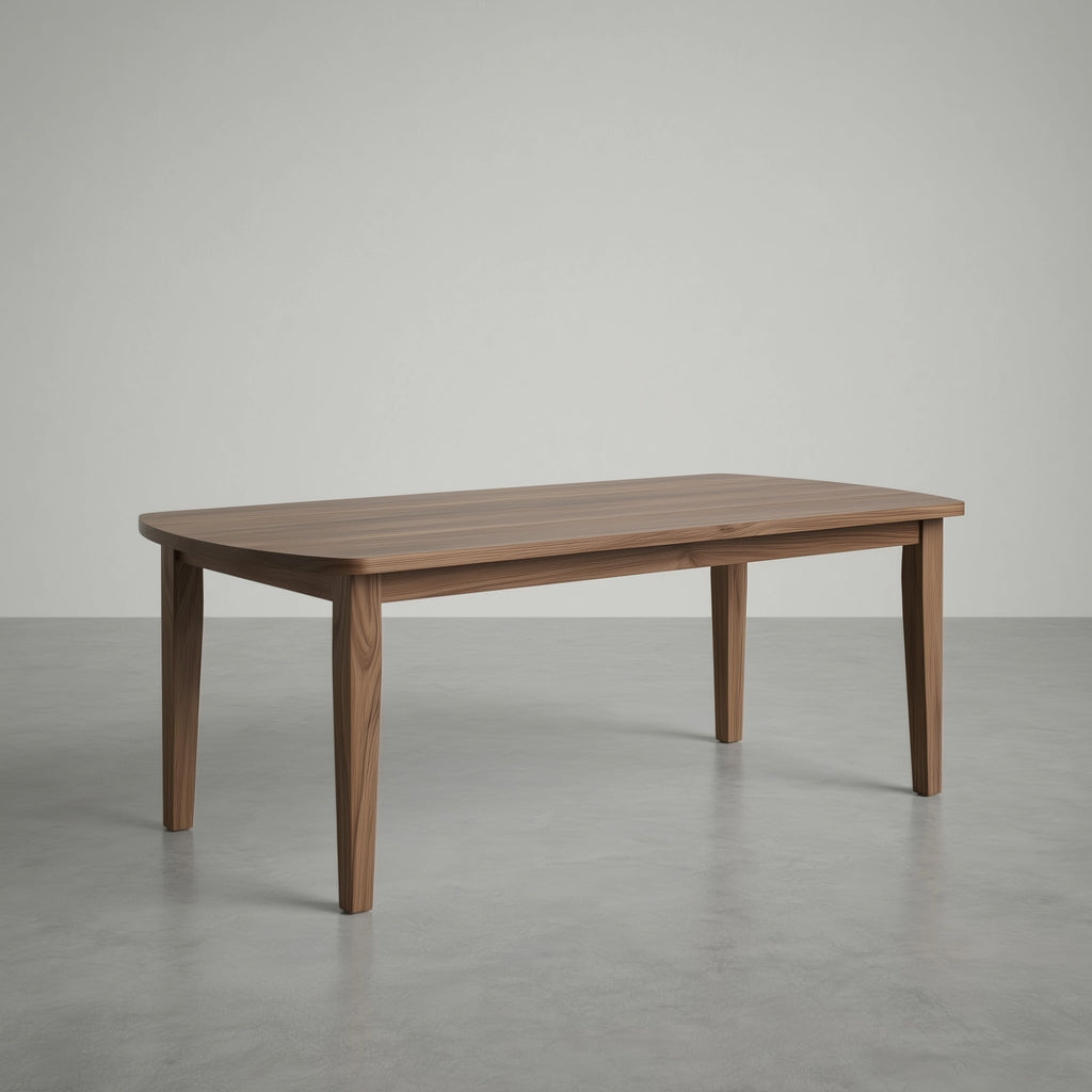 walnut dining table in a large empty space