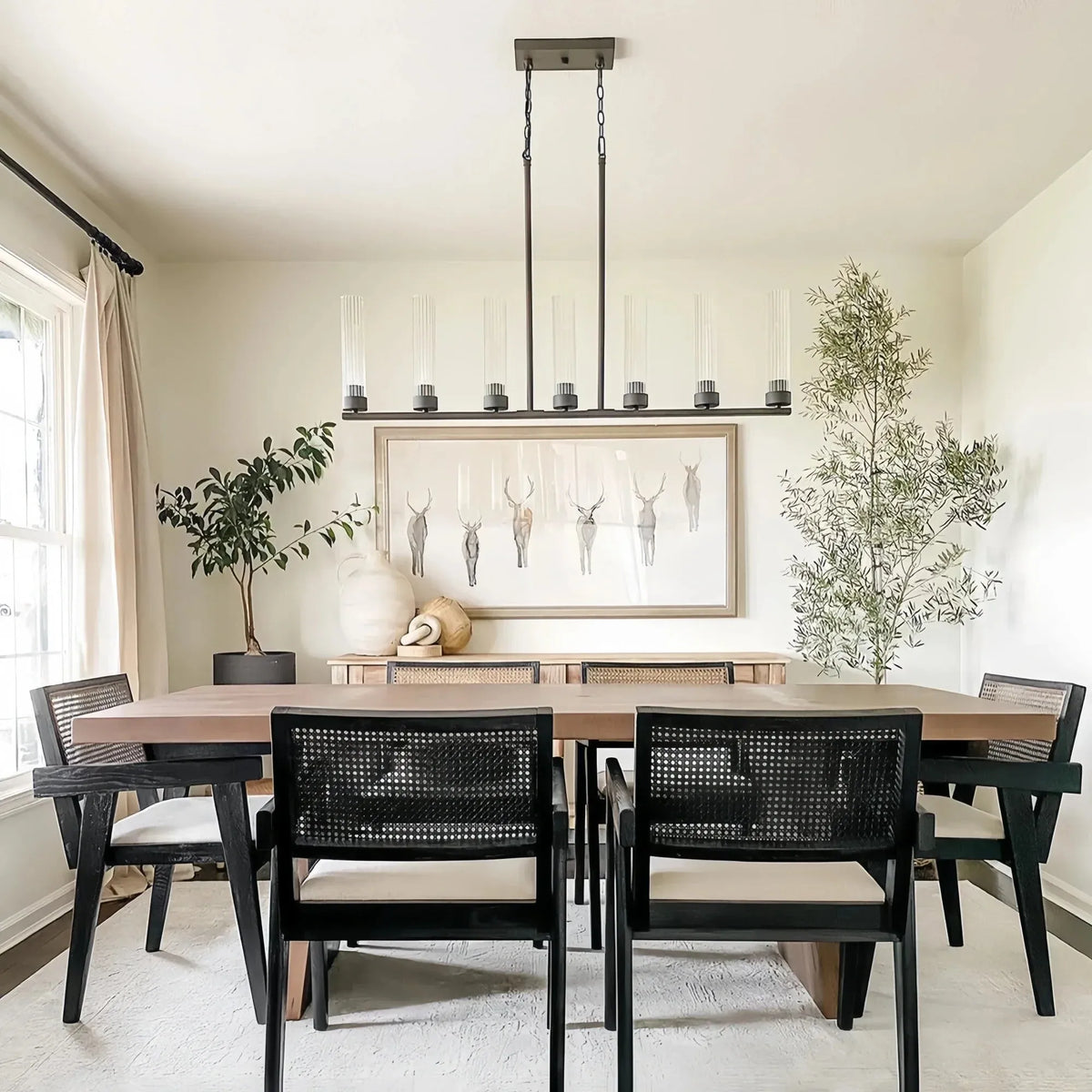 Alaric Linear Chandelier 5/7/8 Light styled in a modern dining room