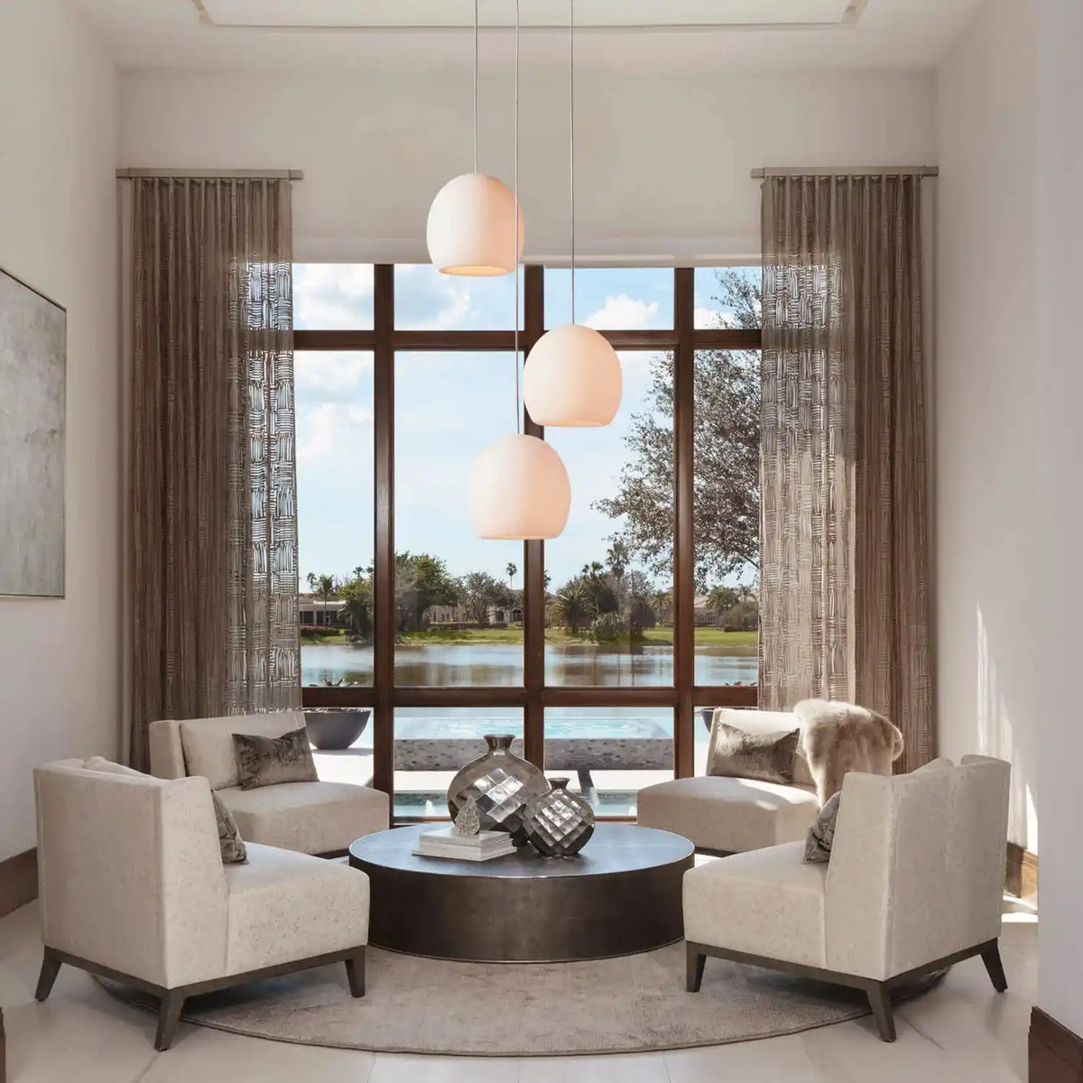 Avila Round Alabaster Chandelier Light styled in a modern bedroom