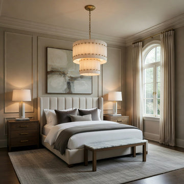 Valmont 23-inch two-tier marble chandelier glowing from within
