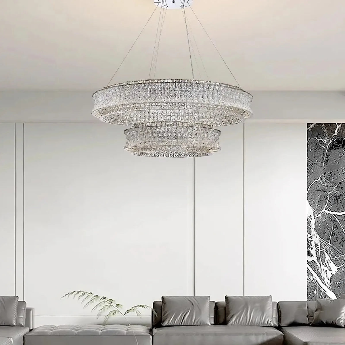 Bacci 39-inch modern crystal chandelier illuminated over a table