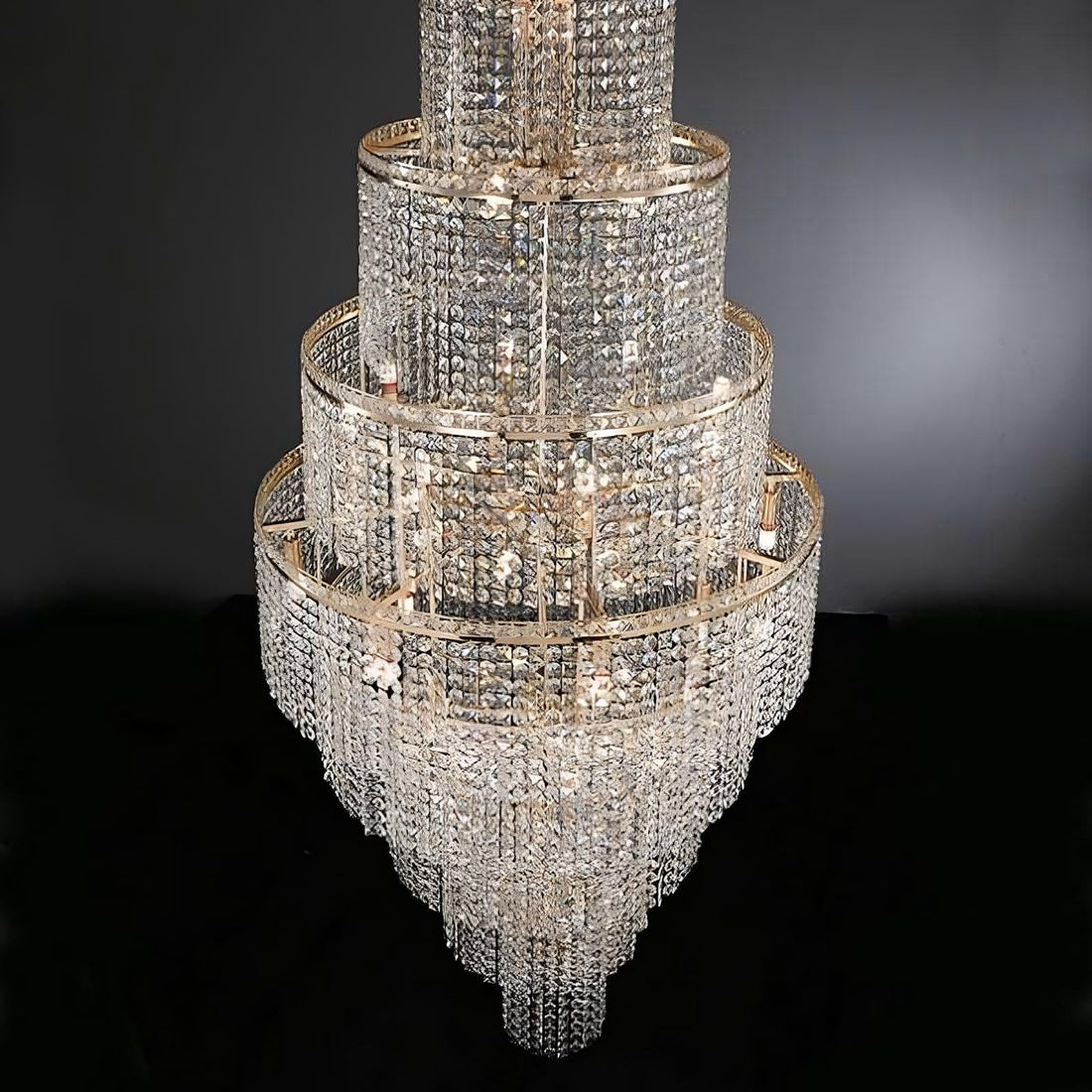 Alleri long crystal staircase chandelier in a grand stairwell