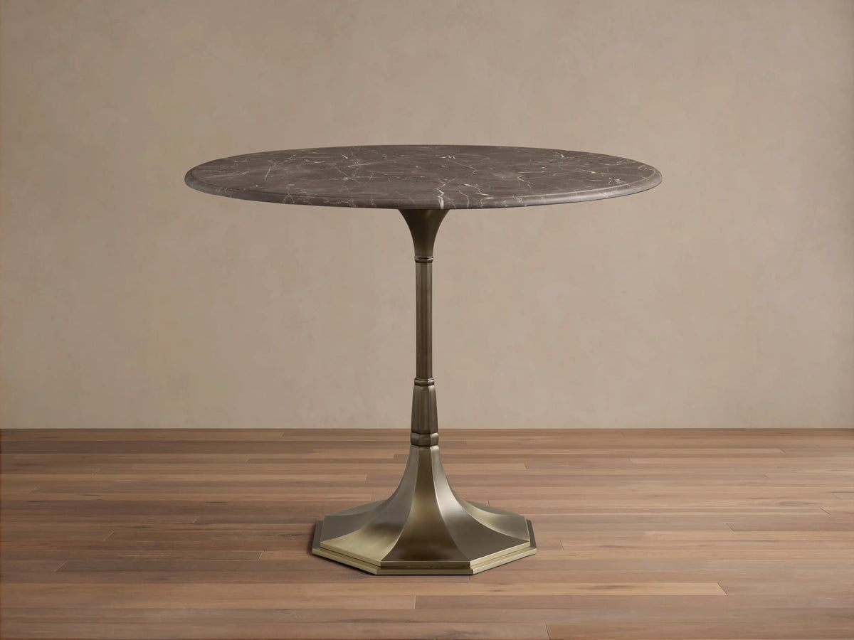 Clemence Bistro Table with Stone Top and Antique Brass Tulip Base