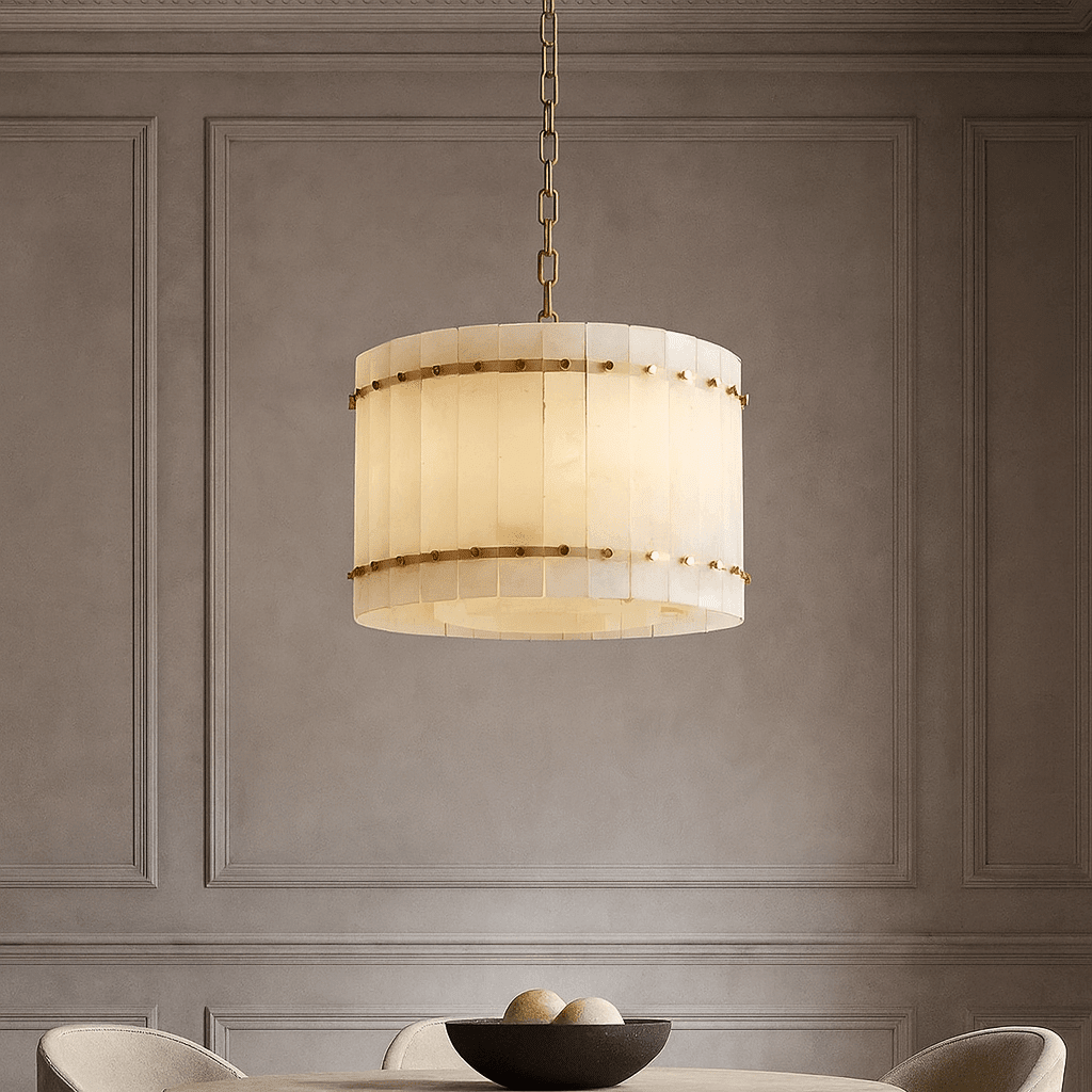 Valmont 16-inch round marble chandelier glowing warm from within