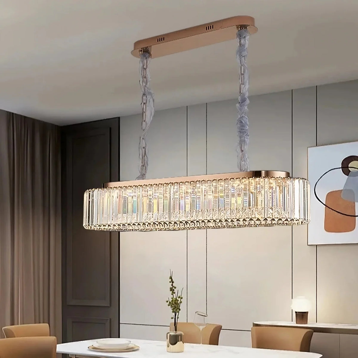 Gio crystal dining chandelier shown in a larger size over a kitchen island