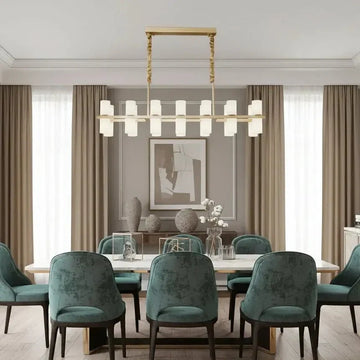 Lunara linear marble chandelier over a dining table