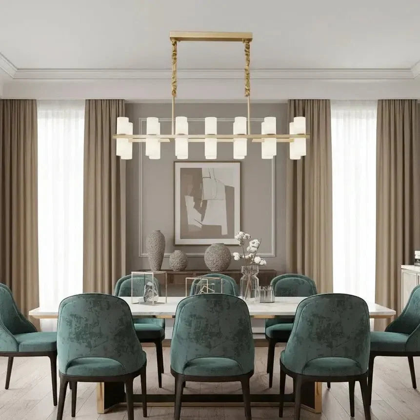 Lunara linear marble chandelier over a dining table