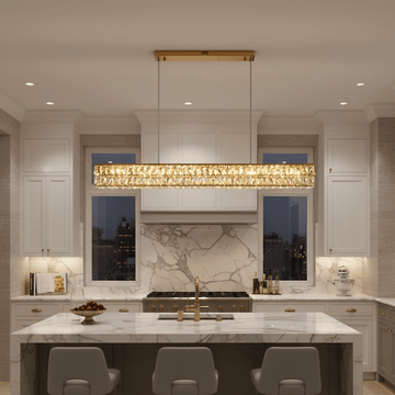 Bacci gold crystal linear dining chandelier over a long table