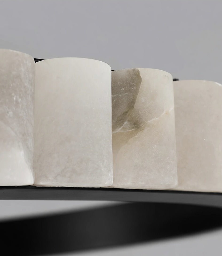 Hampton marble chandelier warm glow through natural stone