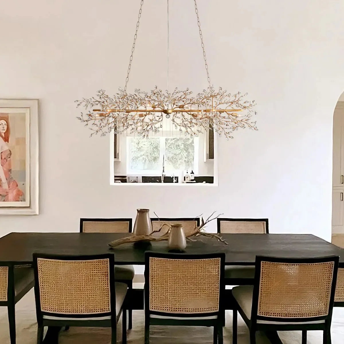 Foglia Linear Chandelier 43" 51" 68"W styled in a modern dining room