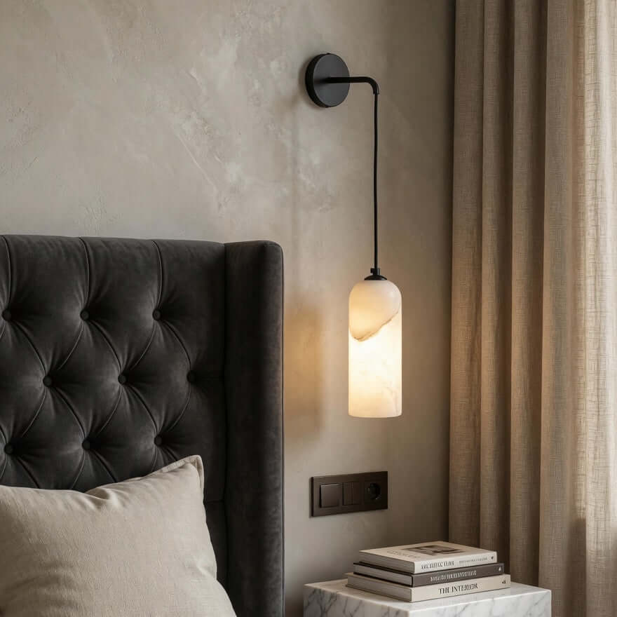 Mirasol marble wall sconce with glowing natural stone shade