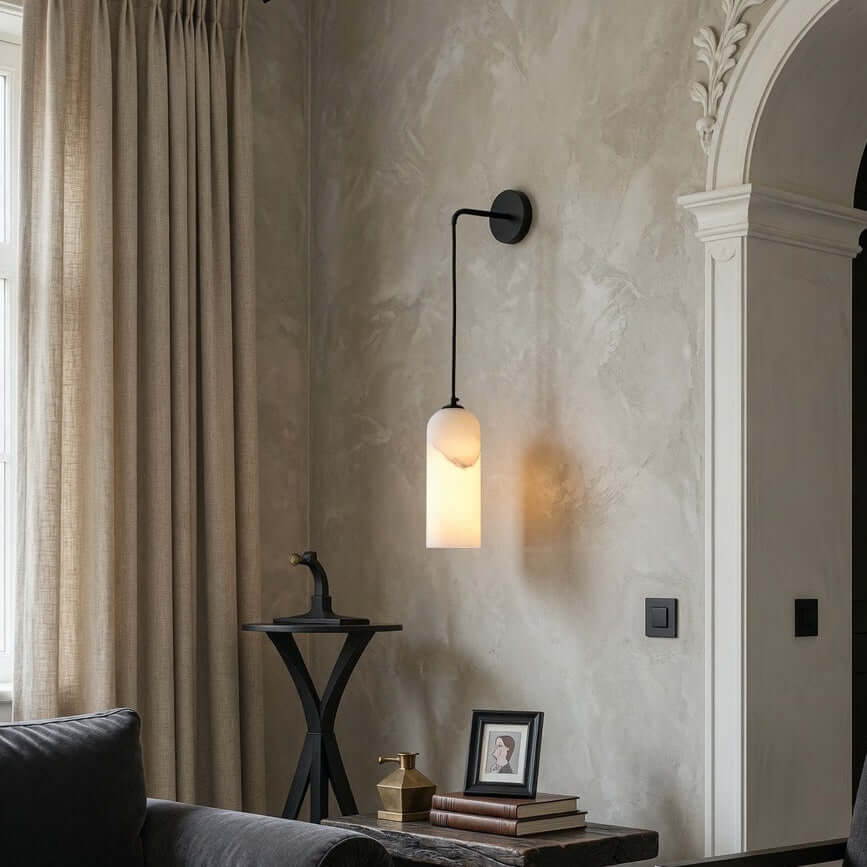Mirasol marble wall sconce with glowing natural stone shade