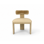 Yucca Dining Chair featuring leather seat and Cylindrical bolster backrest