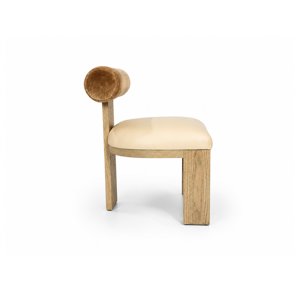 Yucca Dining Chair featuring leather seat and Cylindrical bolster backrest