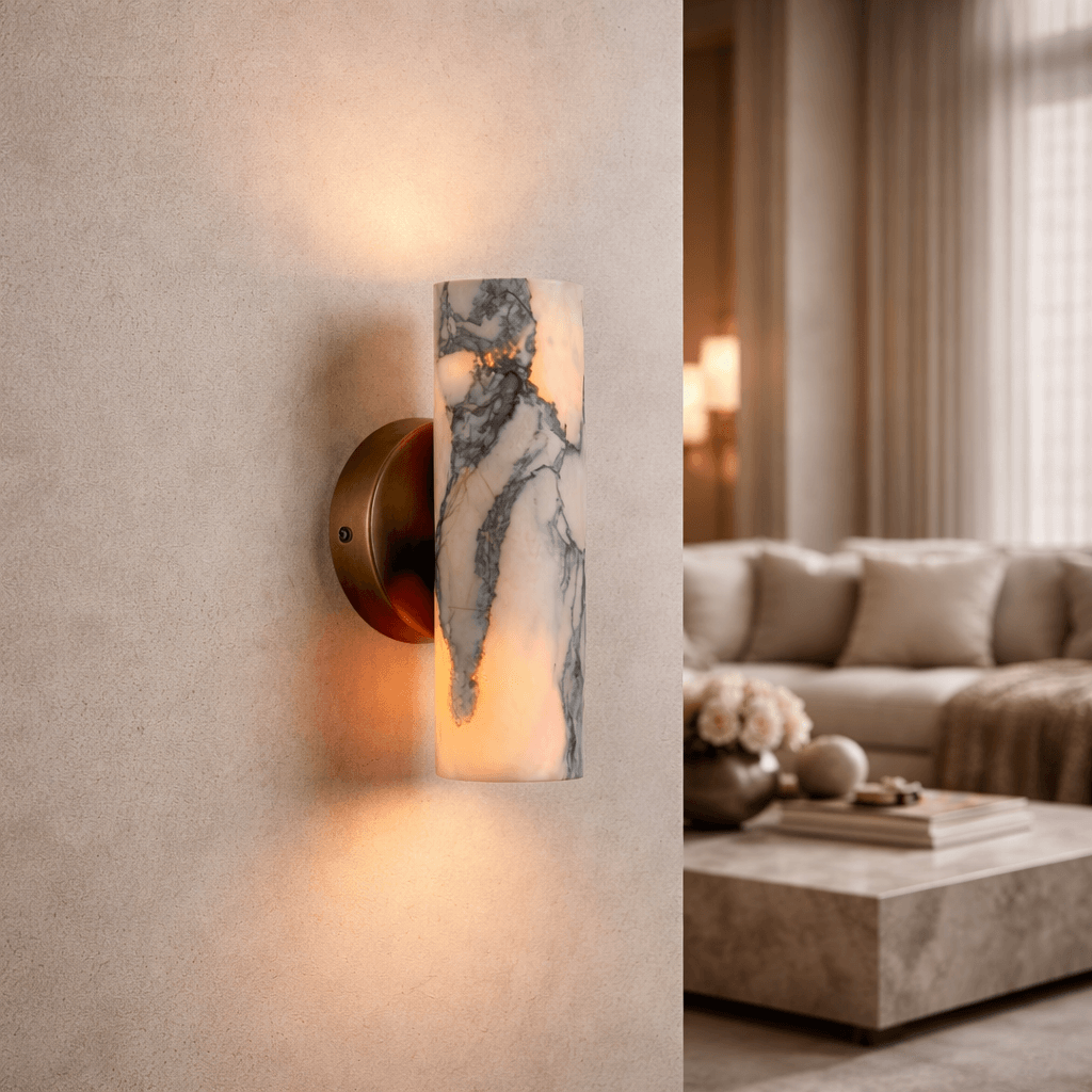 Moonshade marble wall sconce with glowing round stone shade