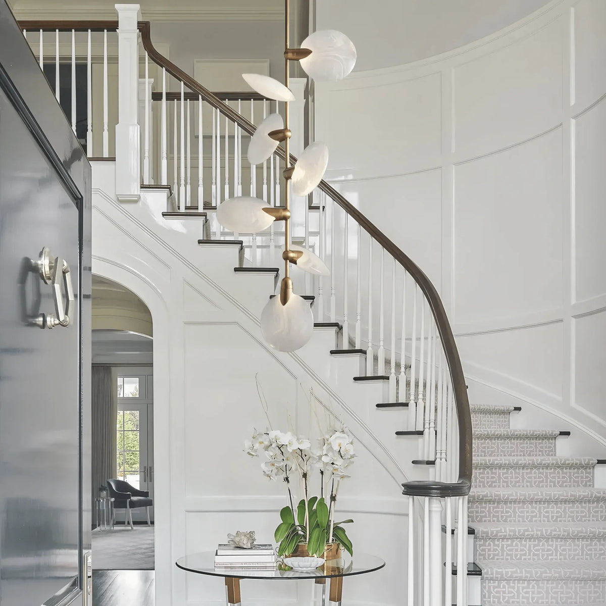 Livia Pendant Modern Alabaster Pendant for Staircase Foyer styled in a modern dining room