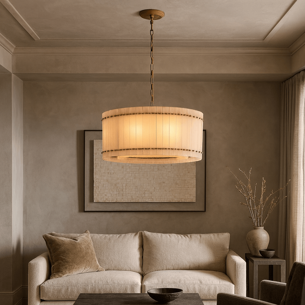 Valmont 24-inch round marble chandelier glowing warm from within