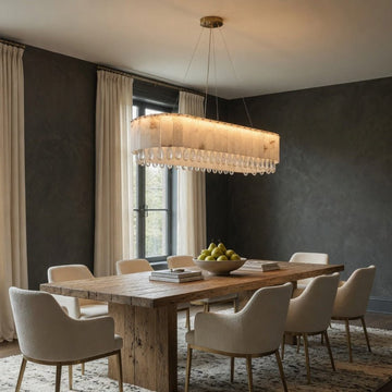 Stuart marble and crystal dining chandelier over a table