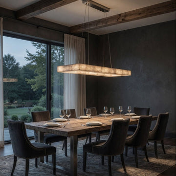 Owens linear marble chandelier on a steel frame over a dining table