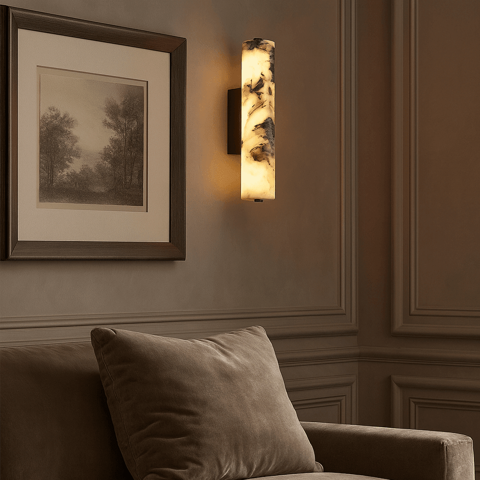 Valmont cylinder sconce with glowing marble shade