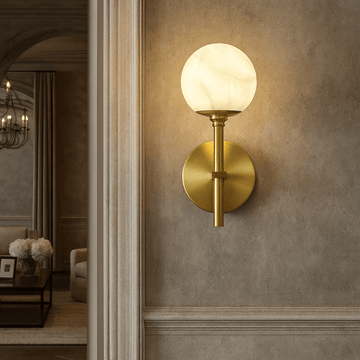 Aria marble and copper wall sconce in a hallway