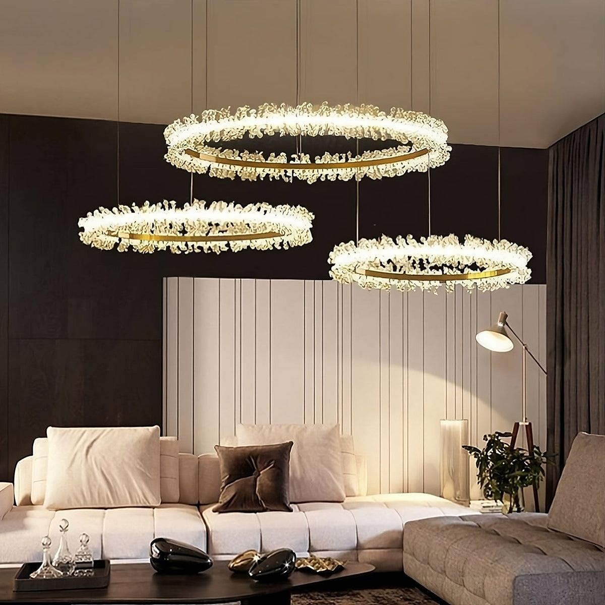 Capri 3-ring crystal chandelier by Morsale.com, three cascading halos of hand-cut crystal on brushed stainless steel above a dining table.