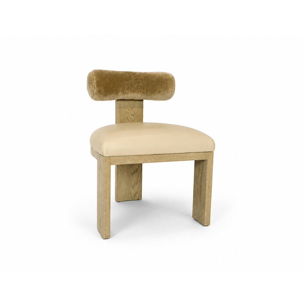 Yucca Dining Chair featuring leather seat and Cylindrical bolster backrest